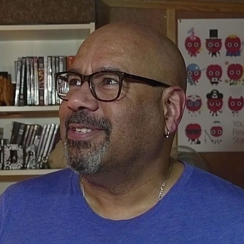 Mike Little, looking upwards, thoughtfully.