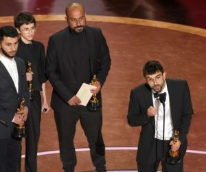 The four directors of No Man's Land collecting their Oscars